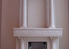ornate fireplace surround as well as overmantle