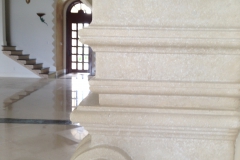 side detail of a stone fireplace