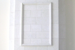 overmantel and stone fireplace mantel