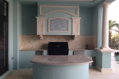 loggia with bbq area, cast stone columns and trim