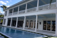 outdoor living pool area columns pavers